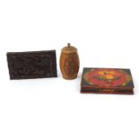 Indian woodenware including a workbox decorated with a female in traditional dress and plaque carved