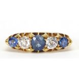 Victorian 18ct gold sapphire and diamond five stone ring, the central sapphire approximately 4.8mm x