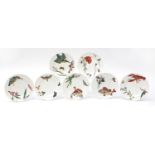 Minton, seven Victorian Aesthetic dessert plates decorated with fish, insects and flowers, each 23cm