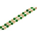 Chinese green jade and cultured pearl necklace, 120cm in length, 105.8g :For Further Condition