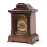 Junghans, German walnut cased chiming bracket clock with brass face and silvered chapter ring having