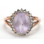 10ct gold amethyst and clear stone ring, size M, 3.4g :For Further Condition Reports Please Visit