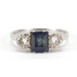 Unmarked platinum sapphire and diamond ring, the sapphire approximately 6.4mm x 5.0mm, the