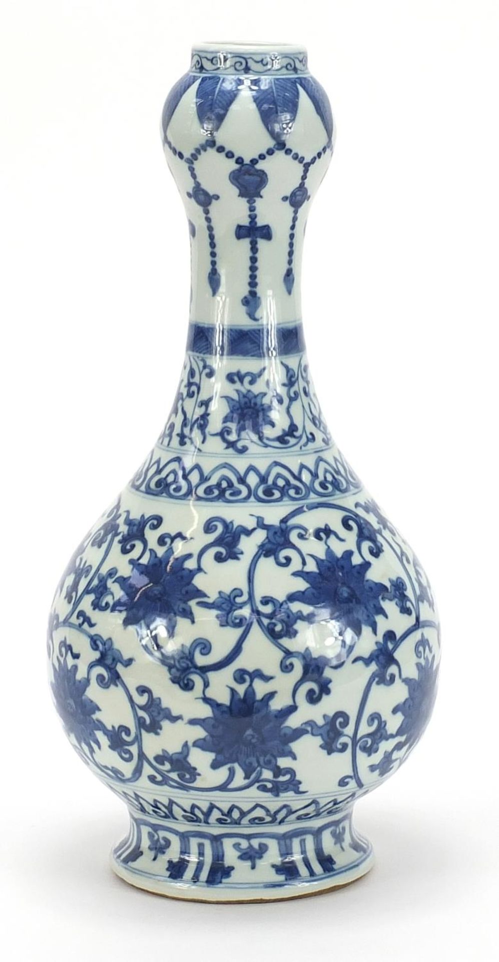 Chinese blue and white porcelain garlic head vase hand painted with flower heads amongst scrolling
