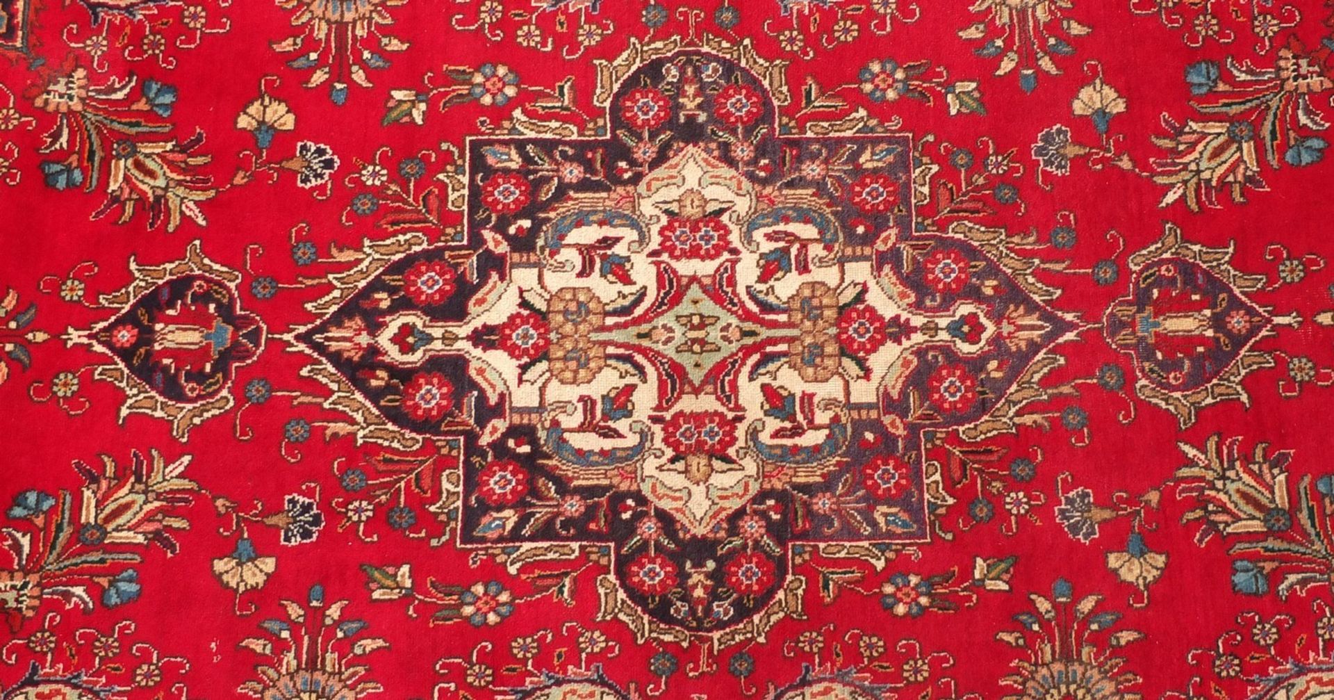 Hand made Iranian carpet with stylised floral pattern onto a red and blue ground, 354cm x 254cm :For - Image 2 of 4