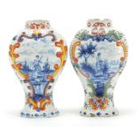 Pair of antique Delft tin glazed baluster vases, each hand painted with a panel of female in a