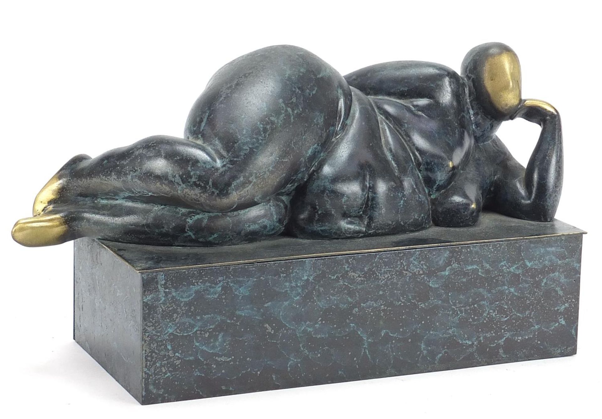 Mid century design patinated bronze sculpture of a reclining nude female, 30cm in length :For