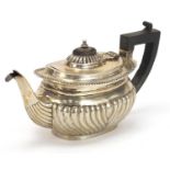 Thomas Hayes, Victorian silver teapot with demi fluted body and ebonised handle and knop, London