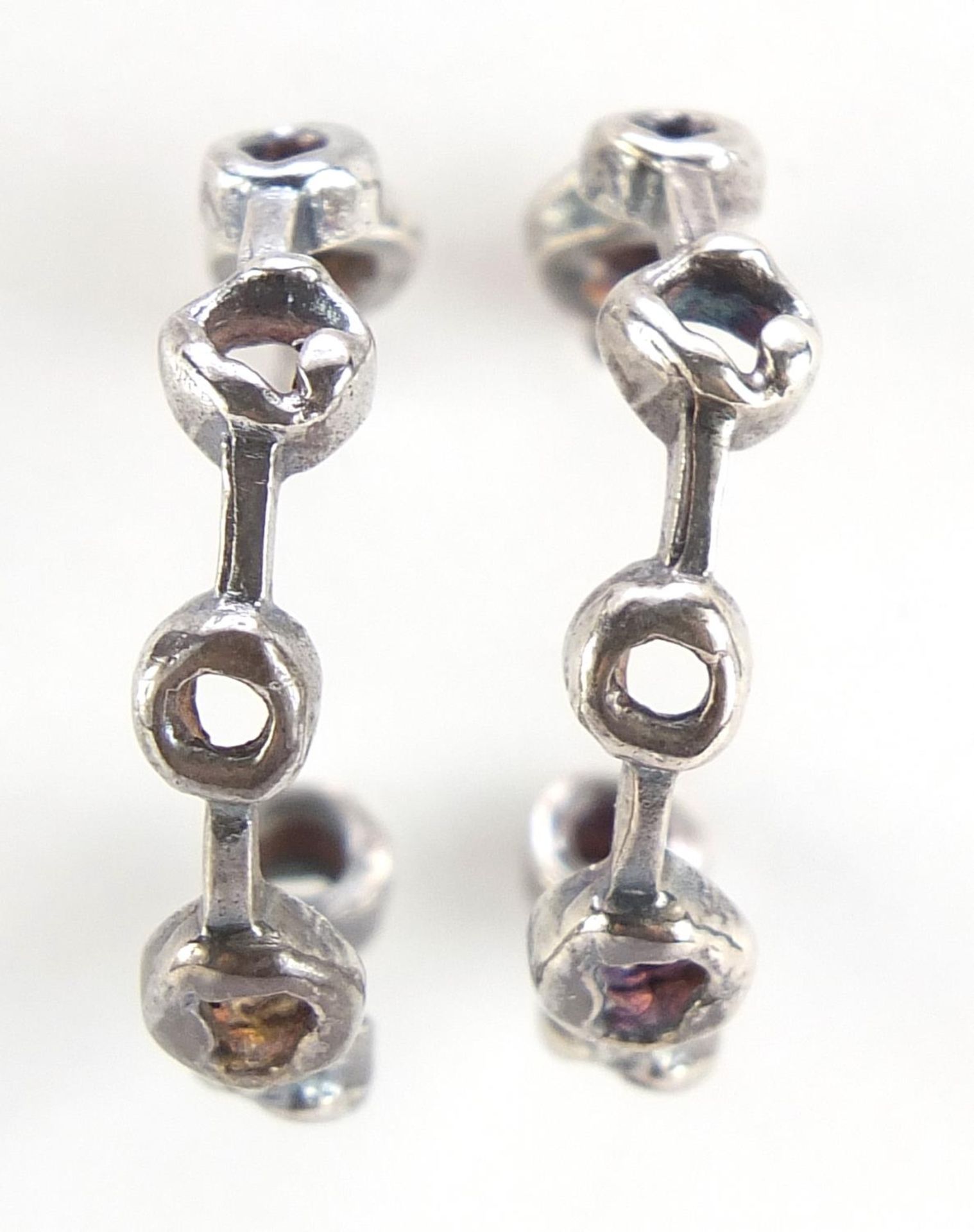 John Donald, pair of Modernist silver hoop earrings, 2cm in diameter, 5.2g :For Further Condition