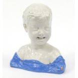 Italian pottery bust of a child, 31cm high :For Further Condition Reports Please Visit Our