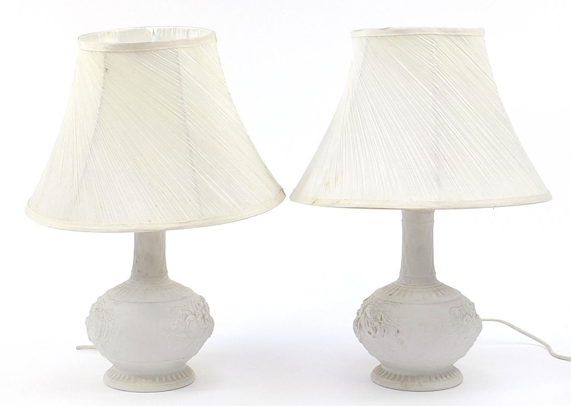 Pair of parian porcelain floral table lamps with silk lined shades, each 50cm high :For Further