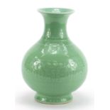 Chinese porcelain celadon glazed vase decorated under glaze in low relief, six figure character