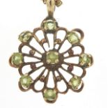 9ct gold peridot pendant on a 9ct gold necklace, 2.5cm high and 40cm in length, total 3.8g :For