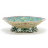 Chinese porcelain footed flower head dish hand painted with bats amongst peaches, iron red character