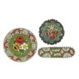 Three vintage Italian micro mosaic brooches including one silver, the largest 3.5cm in diameter :For