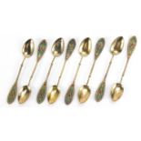 Johan G Kjaerland, set of eight Norwegian silver gilt and plique à jour enamel teaspoons housed in a