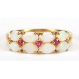 9ct gold opal and ruby ring, size R, 2.6g :For Further Condition Reports Please Visit Our Website,
