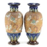 Large pair of Doulton Lambeth stoneware vases hand painted with flowers, each 31cm high :For Further