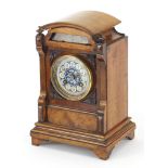 19th century walnut mantle clock with foliate dial having Arabic numerals, the movement numbered