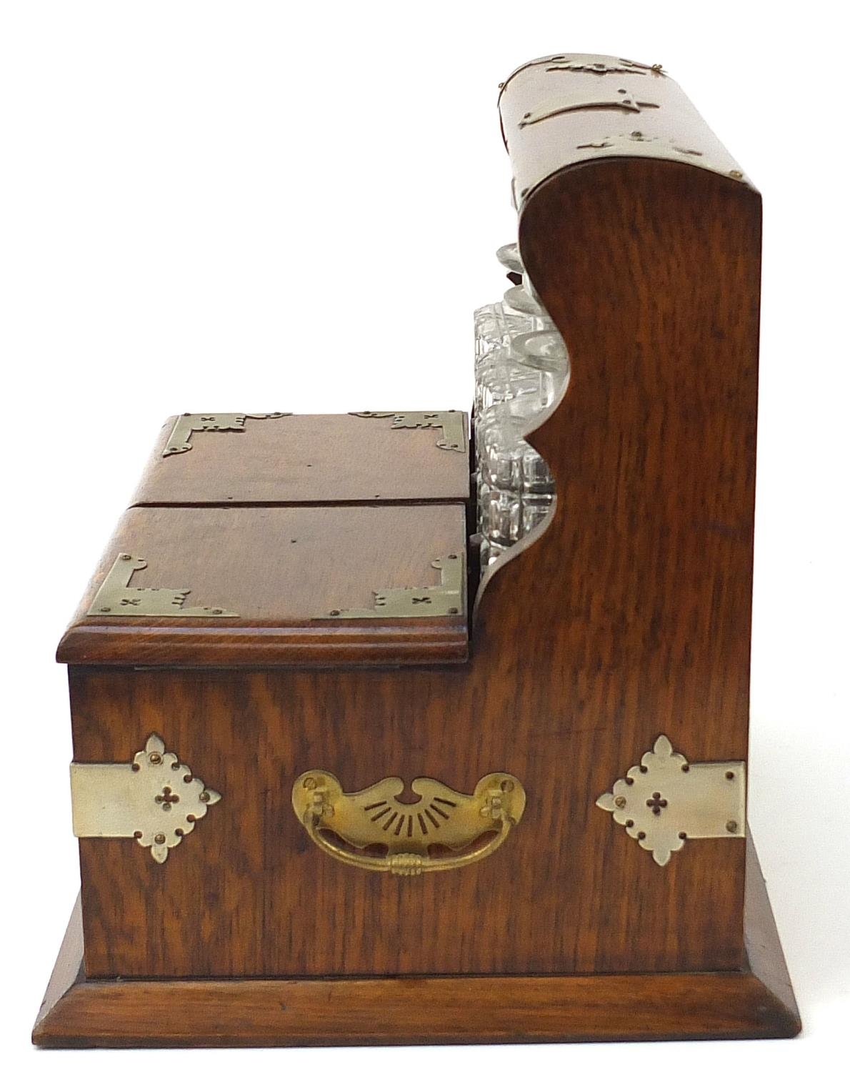 Victorian oak tantalus compendium with metal mounts and carrying handles fitted with three glass - Image 7 of 7