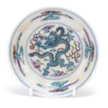 Chinese porcelain doucai dish hand painted with a dragon amongst clouds chasing a flaming pearl, six