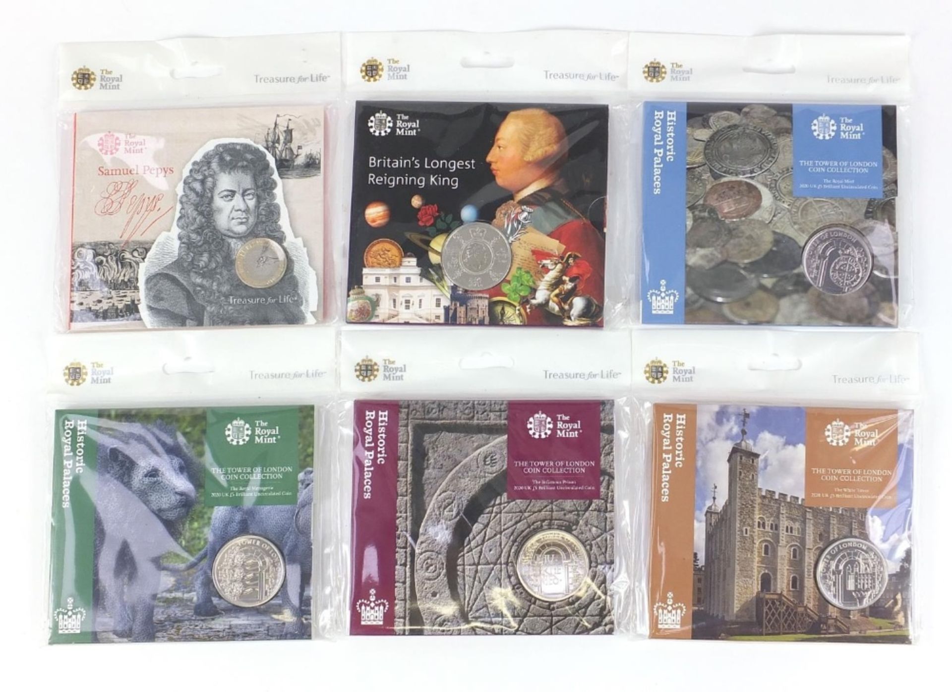 Six Royal Mint uncirculated five and two pound coins comprising four Historic Royal Palaces,