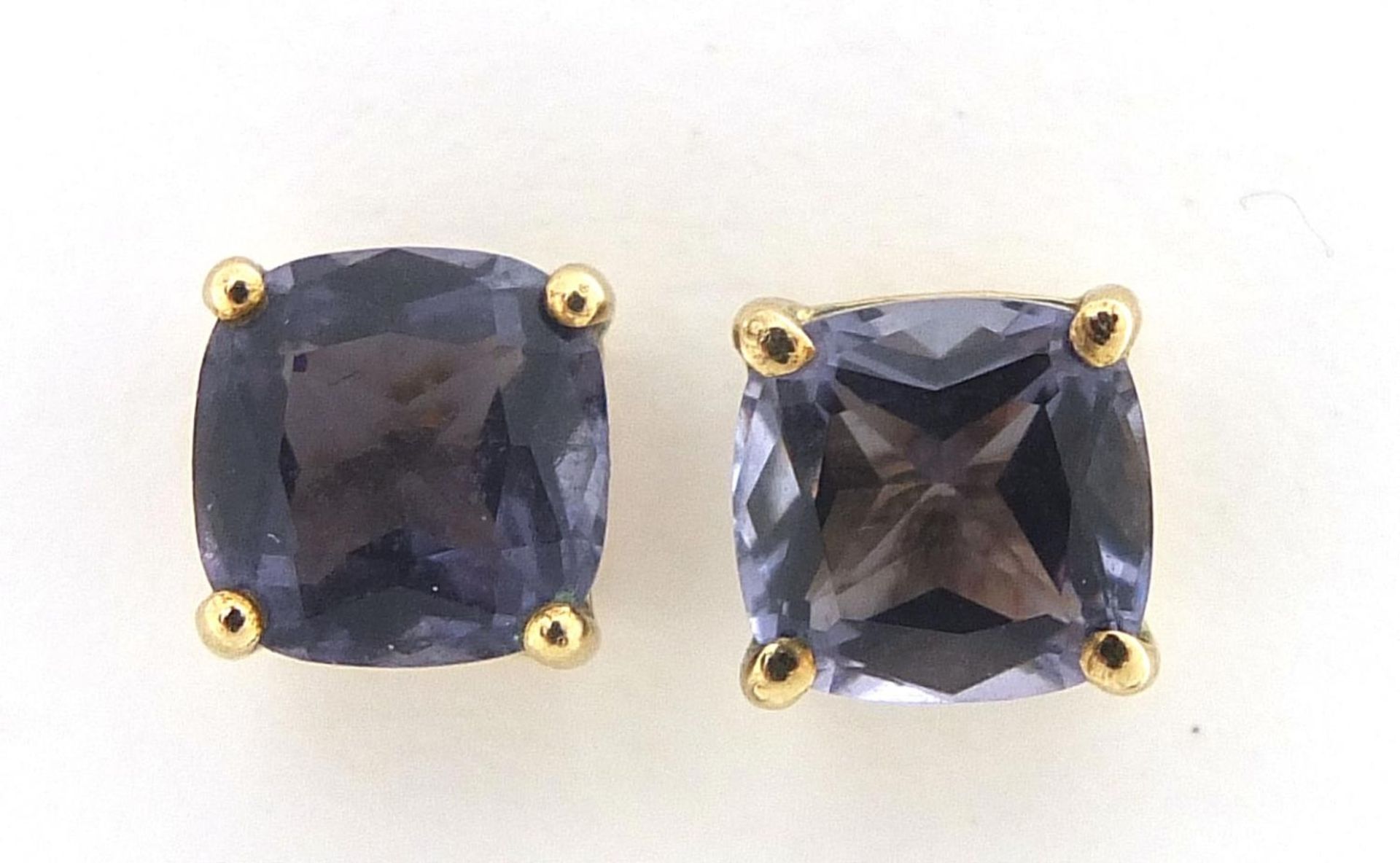 Pair of 9ct gold purple stone stud earrings, possibly tanzanite, 6.5mm x 6.5mm, 1.3g :For Further