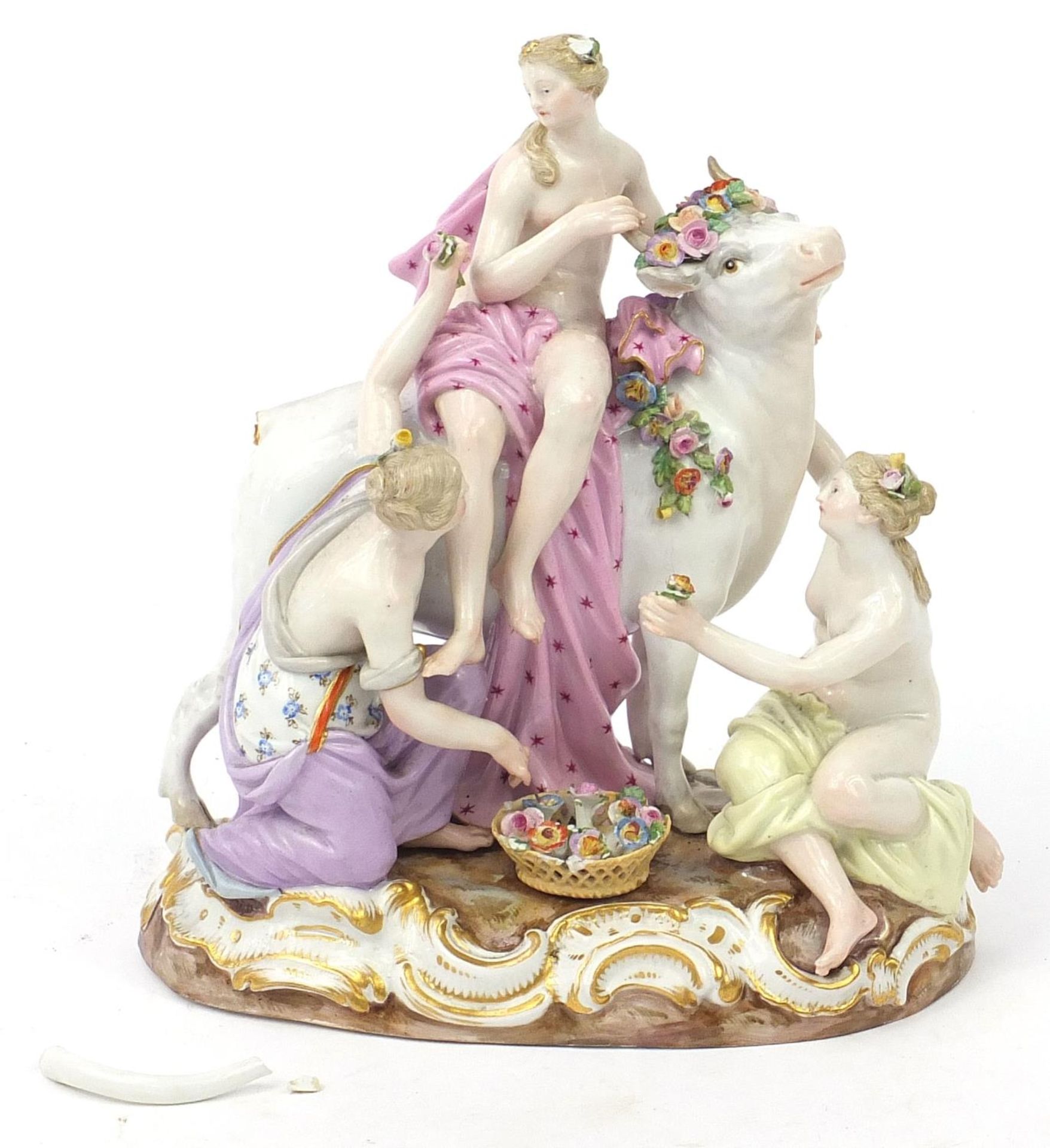 Meissen, 19th century German porcelain figure group of three scantily dressed females and a bull,