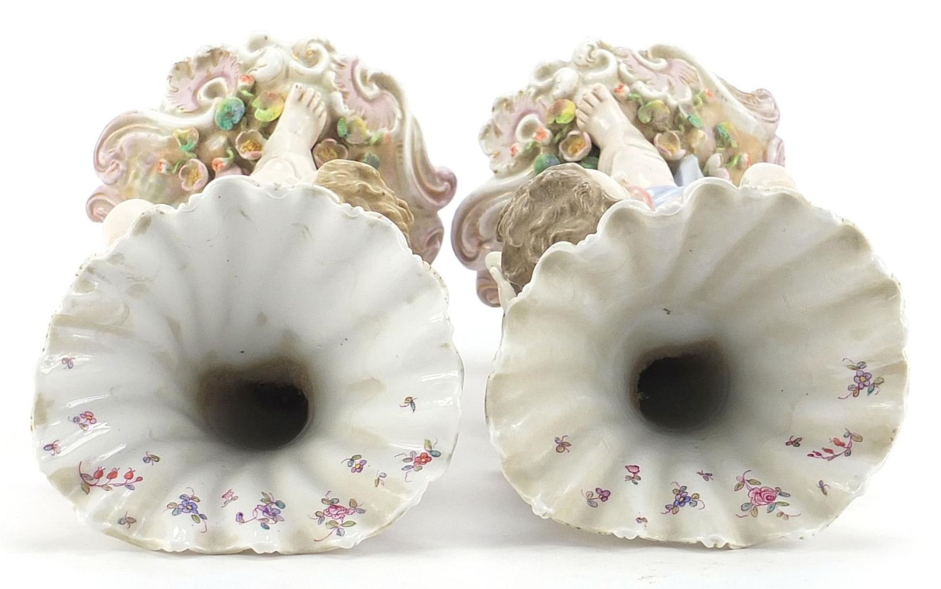 Pair of Continental porcelain Putti and cornucopia design spill vases with floral encrusted bases, - Bild 3 aus 5