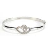 9ct white gold double love heart bangle set with clear stones, 6.5cm wide, 6.2g :For Further