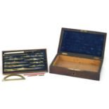 Victorian rosewood drawing set with fitted lift out interior, housing various brass bone handled