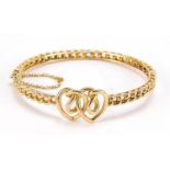 15ct gold double love heart hinged bangle, 6cm wide, 14.0g :For Further Condition Reports Please