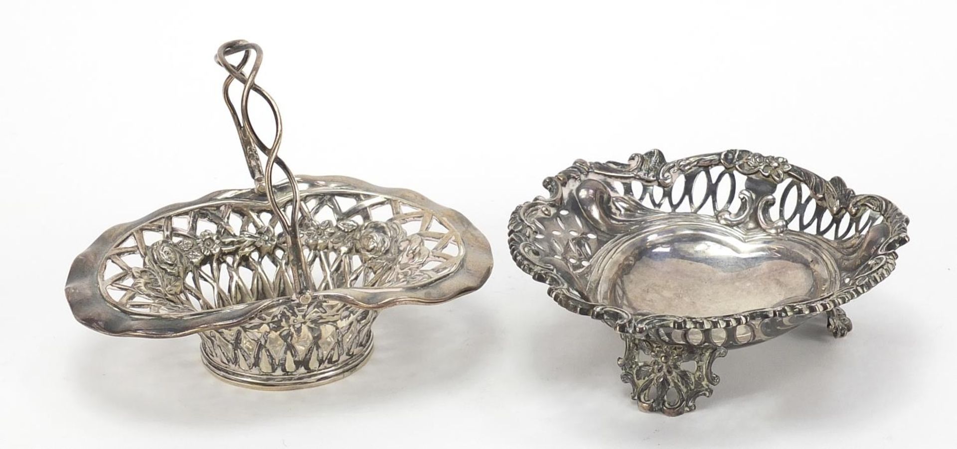 Victorian silver basket with swing handle and a bonbon dish raised on three feet, the basket by