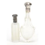 Two Dutch silver mounted cut glass scent bottles including one with ribbed body, 12cm and 8.5cm high