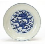 Chinese blue and white porcelain shallow dish hand painted with dragons chasing a flaming pearl