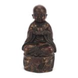 Chino Tibetan partially gilt bronze figure of young Budda, 22.5cm high :For Further Condition