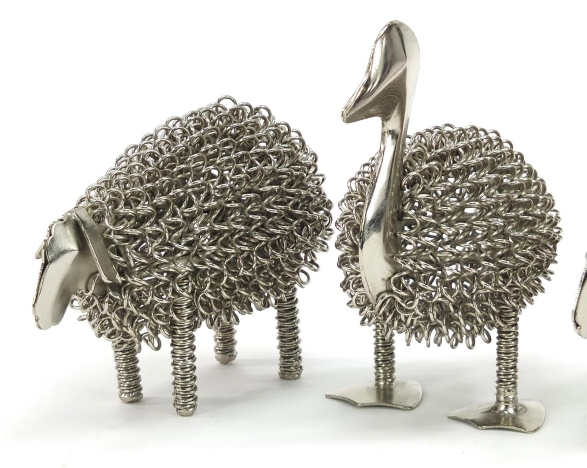 Three white metal animals comprising two sheep and a duck the largest 14cm high :For Further - Image 2 of 5
