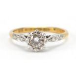 18ct gold and platinum diamond solitaire ring, the diamond approximately 4mm in diameter, size K,