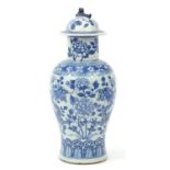 Large Chinese blue and white porcelain baluster vase and cover hand painted with dragons amongst