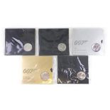 Five James Bond 007 uncirculated five pound coins including The James Bond Collection :For Further