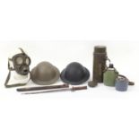 Militaria including a Wilkinson 1907 pattern bayonet with scabbard, flask and two tin helmets :For