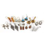 Ten pairs of earrings, some silver, set with semi precious stones including amber, moonstone and