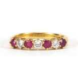 18ct gold diamond and ruby half eternity ring, the diamonds approximately 2.1mm in diameter, size N,