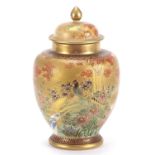 Japanese Satsuma pottery vase and cover hand painted with birds of paradise amongst flowers in a