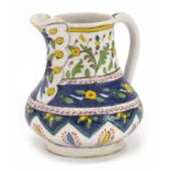 Turkish Kutahya pottery jug hand painted with flowers, 14cm high :For Further Condition Reports