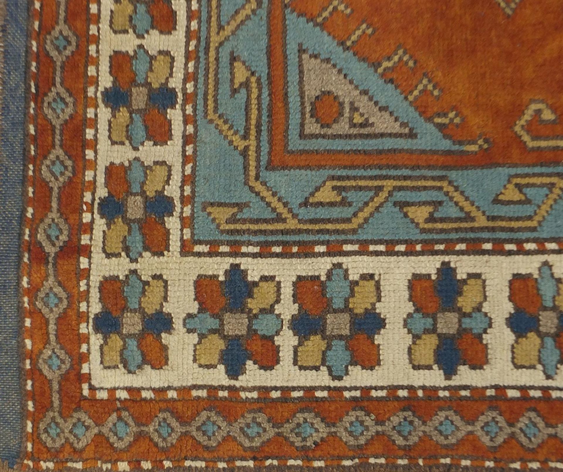 Rectangular Persian rug having a floral border onto orange grounds, 303cm x 131cm :For Further - Bild 3 aus 4