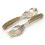 Pair of Indian silver and horn salad servers, the silver pierced and engraved with serpents and
