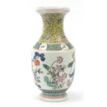 Chinese porcelain vase hand painted in the famille rose palette with flowers, six figure character