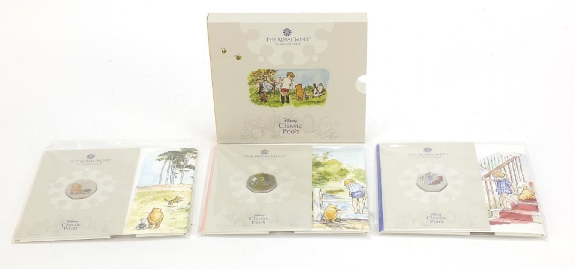 Three Royal Mint Classic Pooh coloured fifty pence pieces :For Further Condition Reports Please