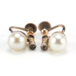 Pair of 9ct gold pearl and clear stone earrings with screw backs, 1.2cm high, 3.0g :For Further